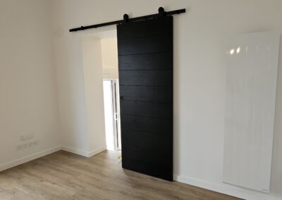 Porte coulissante en applique - MBA MENUISERIE